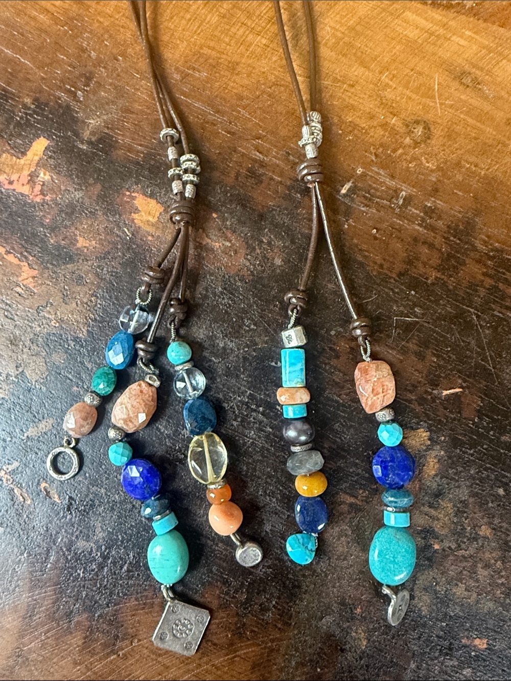5 tassel lariat leather cord necklace. New with tags from Sundance.